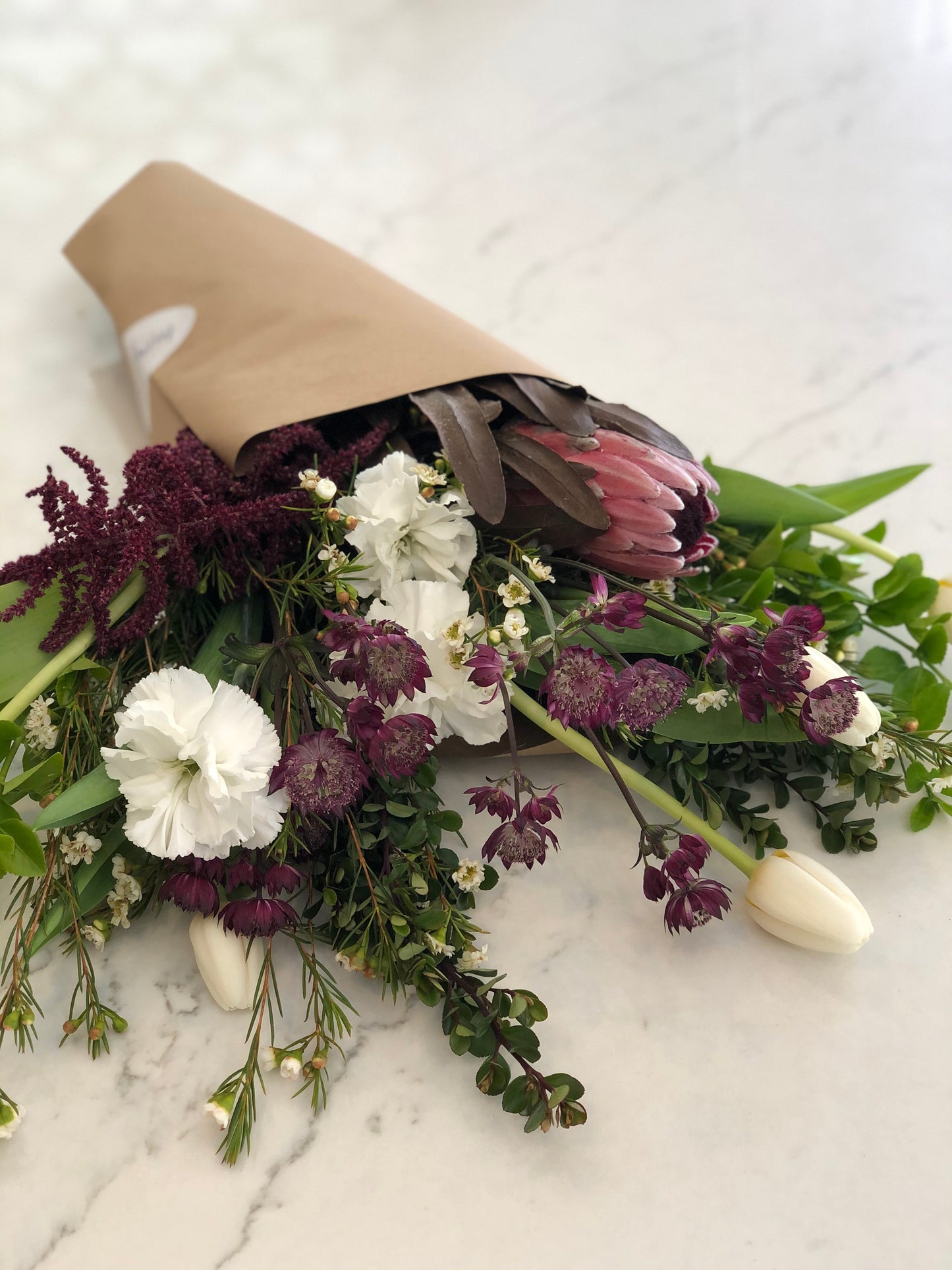 Wrapped Bouquet by Luminous Blooms in Highland Park, IL